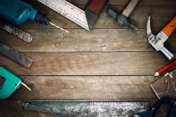istock Group of grunge tools on wooden background with empty space for  text or brand. 669814894