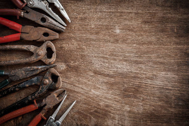istock Group of grunge tools on wooden background with empty space for  text or brand. 669829540