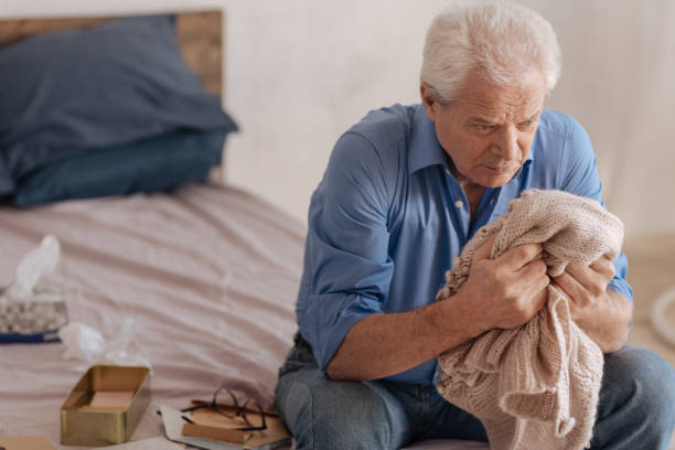 istock Unhappy gloomy man being in grief 669842770