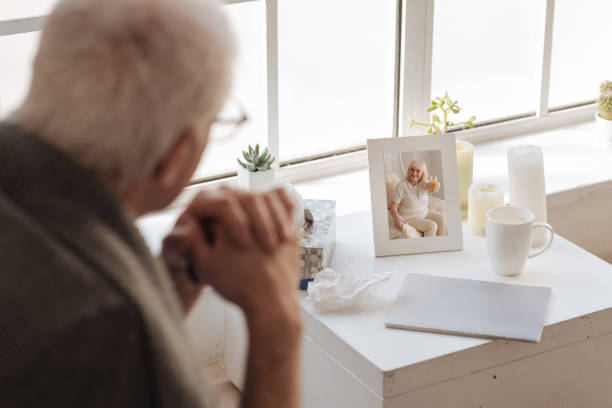 istock Selective focus of a photo standing on the bedside table 669843438