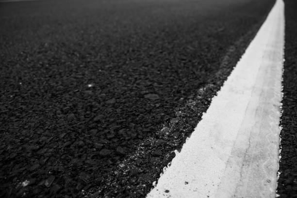 istock Asphalt road line white texture close up. 669843530