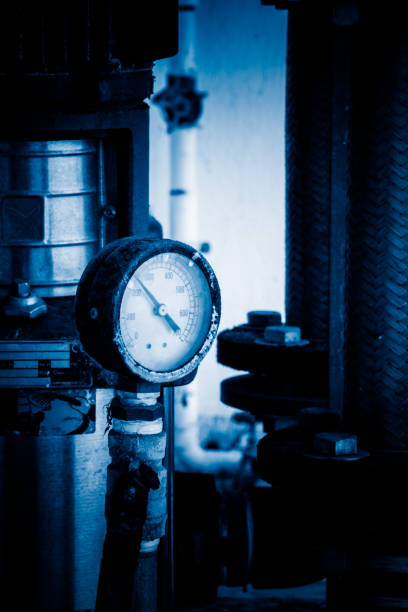 istock steel pipelines and valves in blue tone 669843984