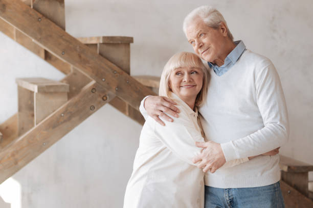 istock Good looking happy couple standing together 669846718