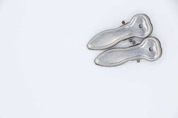 istock Two metal cloth clips on white background 669846796