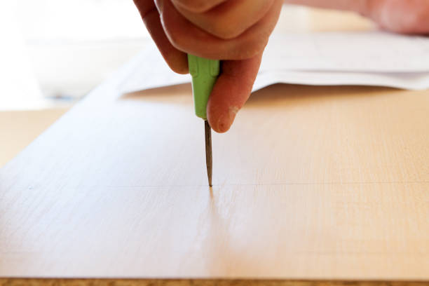 istock hole on a sheet of chipboard 669846864