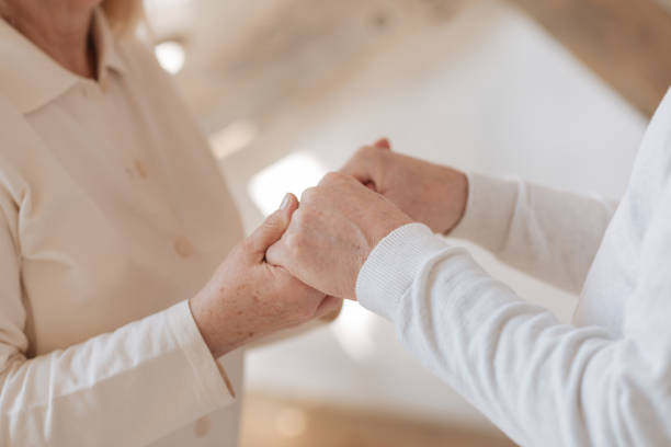 istock Close up of hands being held together 669846932