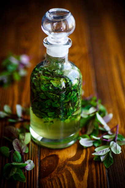 Mint syrup in a glass bottle stock photo