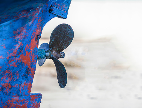 Propeller on an old worn out vessel's hull