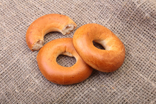 istock Fresh authentic New York style bagel isolated on Canvas cloth background 669861340