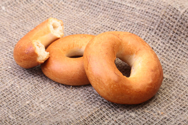 istock Fresh authentic New York style bagel isolated on Canvas cloth background 669861426