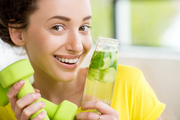 istock Sports woman drinking water 669862748