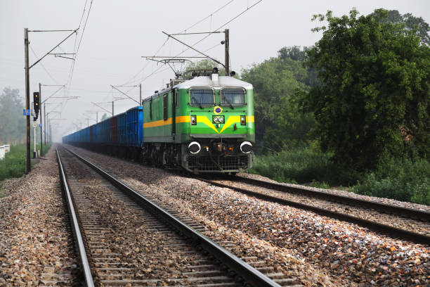 Freight Train Freight train running on track. india train stock pictures, royalty-free photos & images