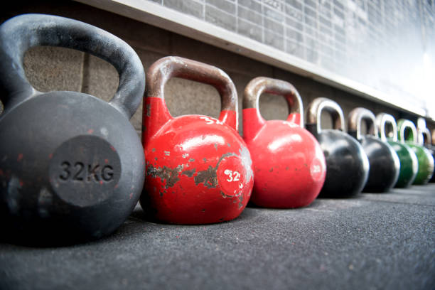 istock Long receding row of kettlebell weights in a gym 669868898
