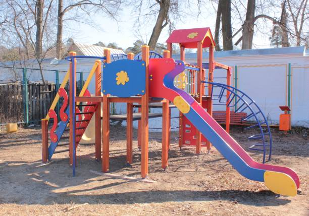 istock A Playground with slides on a Sunny day 669875782
