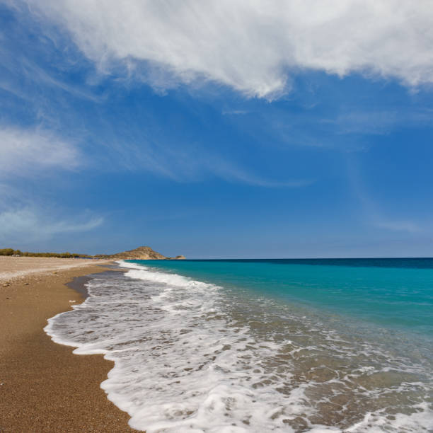 Sunny day on Afandou beach, Rhodes Sandy Afandou beach on Rhodes, Greece afandou stock pictures, royalty-free photos & images