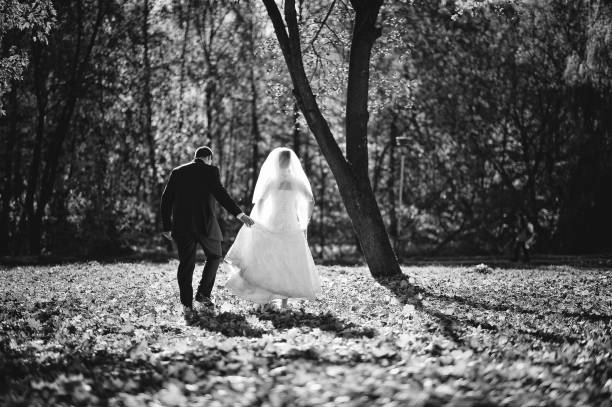 istock Glorious newlyweds at autumn sunshine 669887988