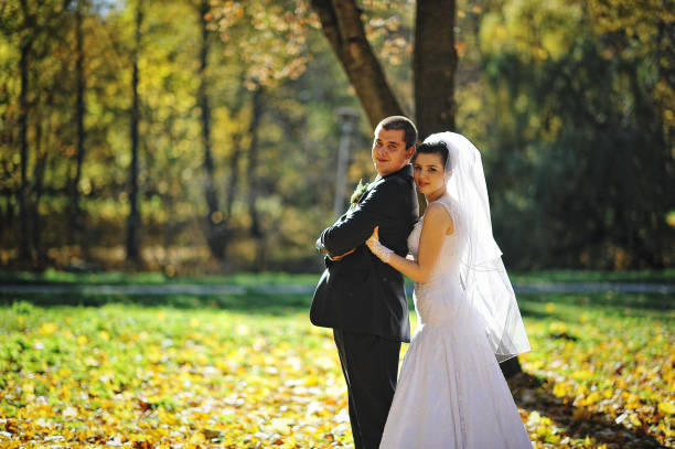 istock Glorious newlyweds at autumn sunshine 669888004