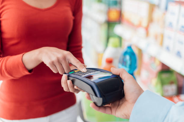 istock Woman at the checkout 669892886
