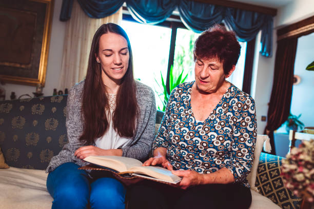 istock Granddaughter asking for help with her homework 669903756