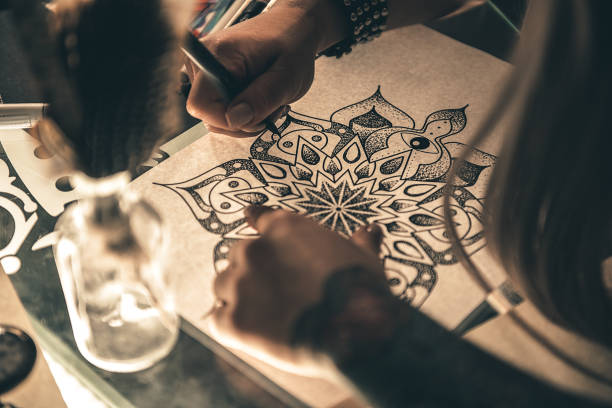istock Woman designing picture at table 669906200