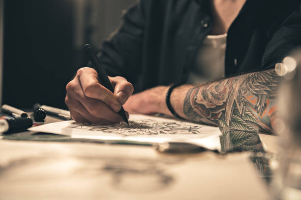 istock Male painting images at table 669907434