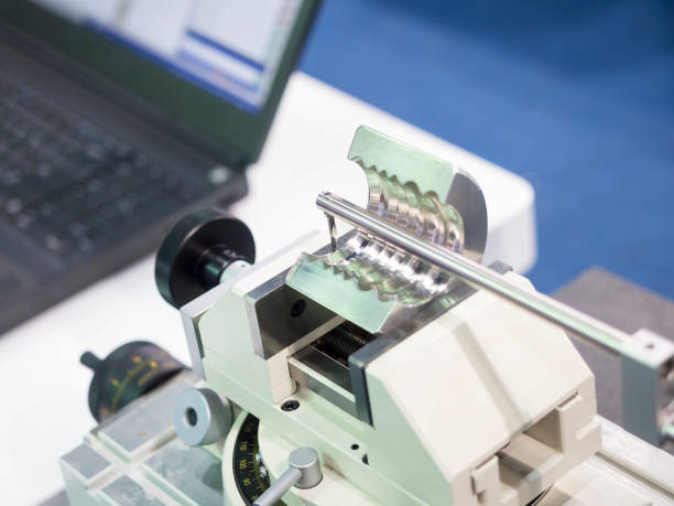 istock operator inspection automotive part by contour measuring machine 669907982