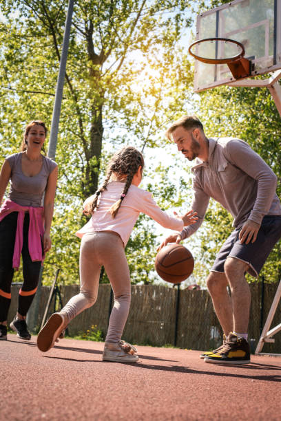 istock Family playing basketball. 669917194