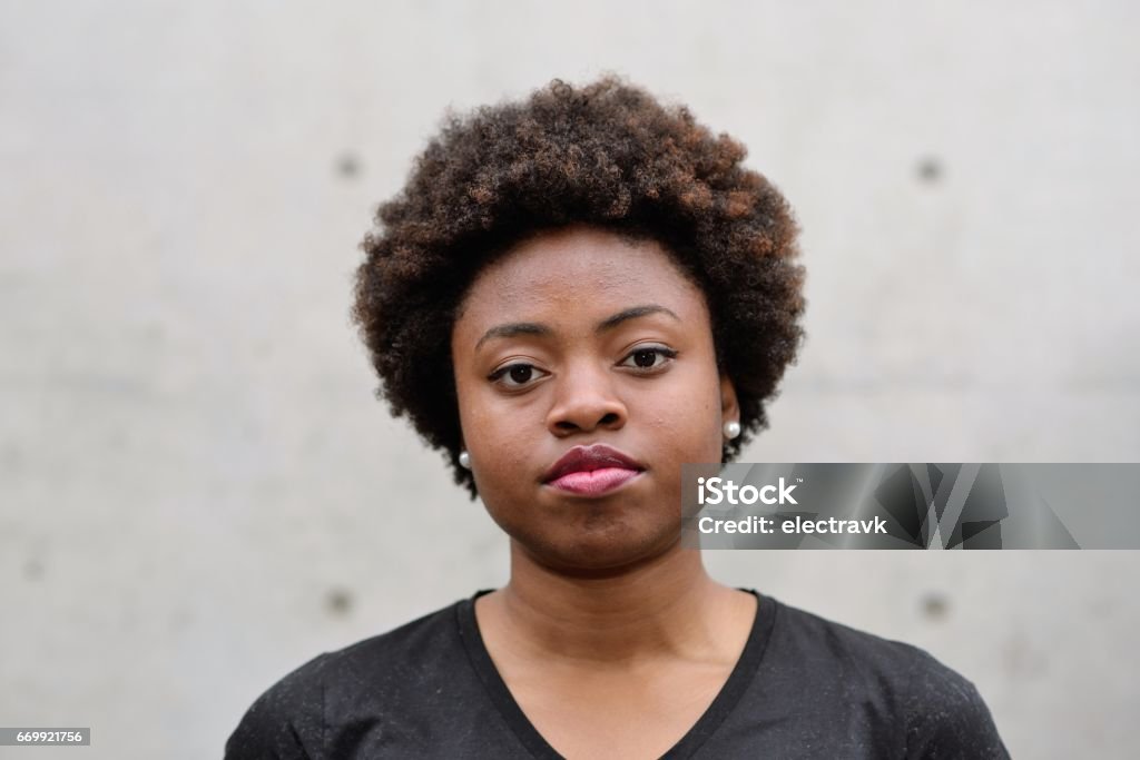 Portrait of young Black woman Portrait of a young Black woman in Tokyo. Serious Stock Photo