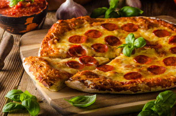 istock Homemade cheese pizza with salami 669922862