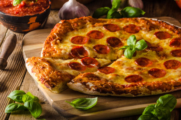 istock Homemade cheese pizza with salami 669922922