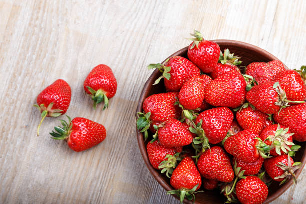 istock ripe strawberries on a wooden background 669936340