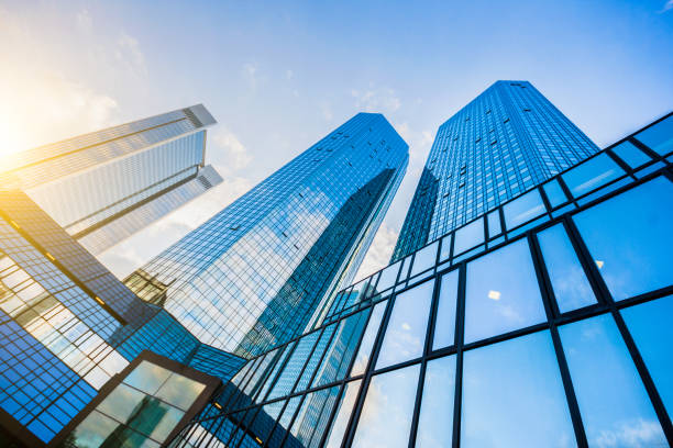 istock Modern skyscrapers in business district at sunset 669936492