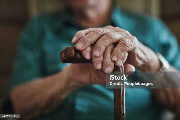 Getting Older Can Bring Senior Health Challenges Stock Photo - Download Image Now - Senior Adult, Senior Men, Walking Cane