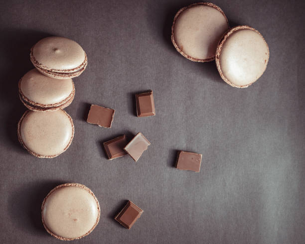 istock Top view of Chocolate pastel brown Macarons or Macaroons 669941768