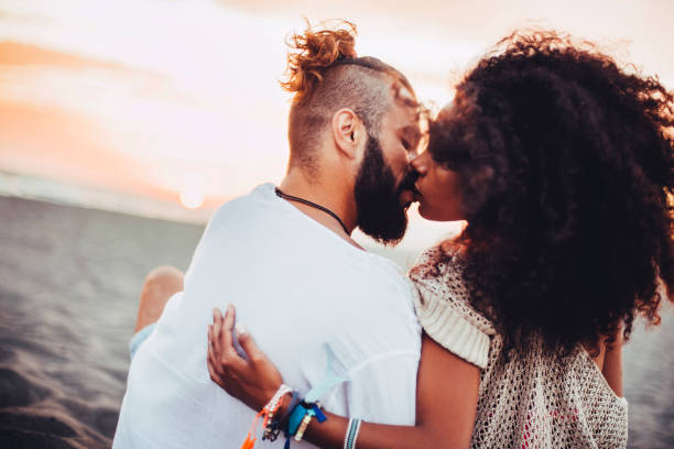 istock Couple kissing and hugging 669947764
