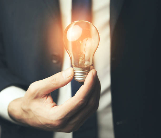 istock creative idea in hand of businessman 669948342