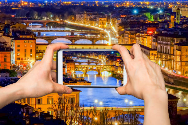 istock Taking pictures on mobile smart phone in Florence, Ponte Vecchio 669959094