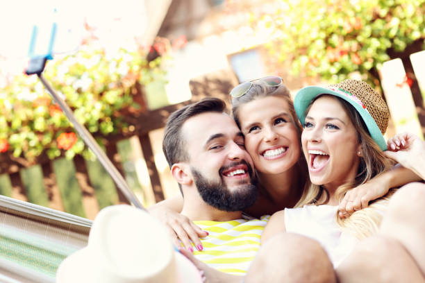 istock Group of friends having fun outdoors in summer 669959568