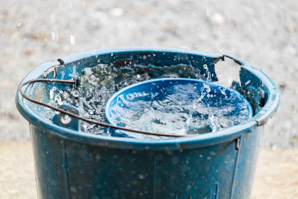 istock pail water dipper blue old rain water 669959592