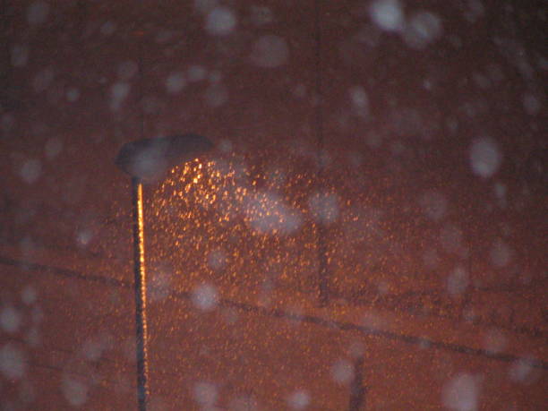 istock Snow in Madrid at night again 669962604