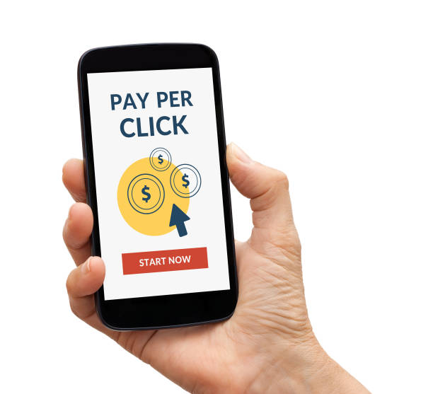 istock Hand holding smart phone with Pay Per Click concept on screen 669966454