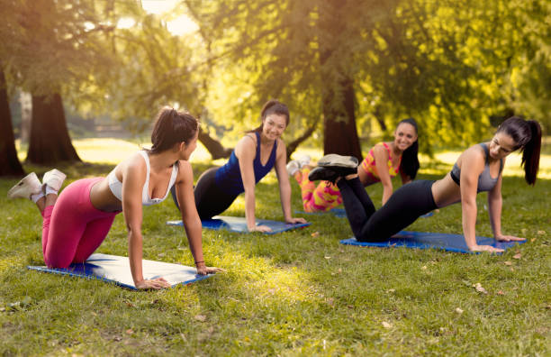 istock Young Women Exercising In Nature 669971240