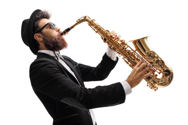 istock Man in a suit playing on a saxophone 669981598