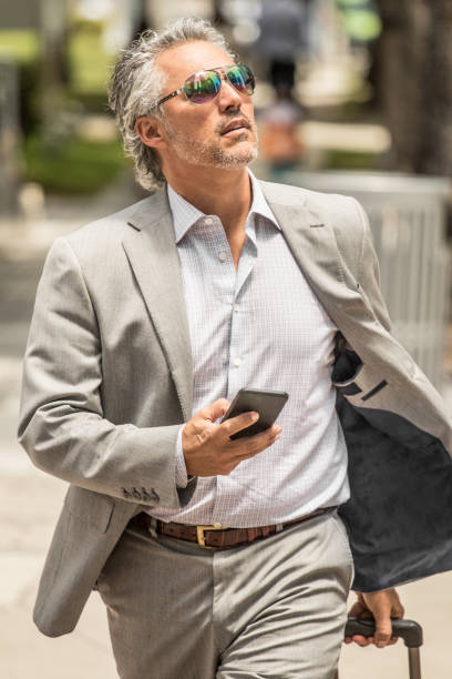 istock Traveling Business man traveling with cell 669989506