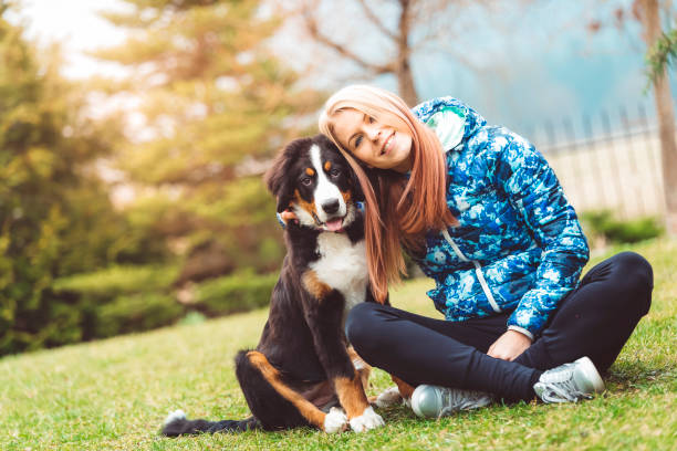 istock Cute puppy and a girl 669989864
