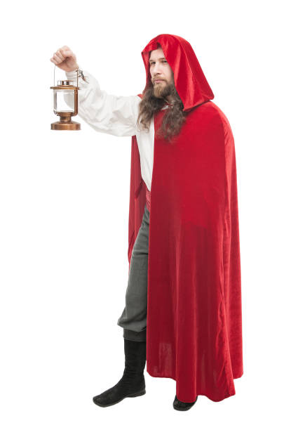 istock Medieval man in cape with lamp isolated 669996574