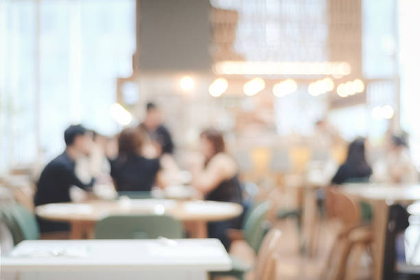 istock Blurred background : blur restaurant with people on bokeh light background 669996814