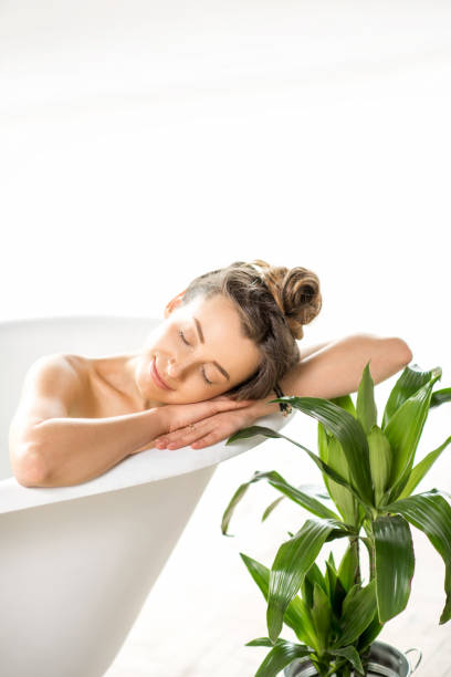 istock Woman relaxing in the bathtube 670001450