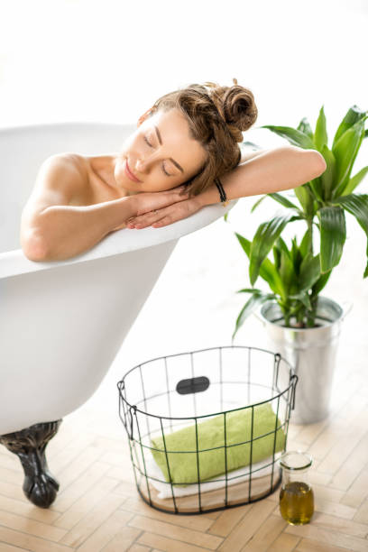 istock Woman relaxing in the bathtube 670001492