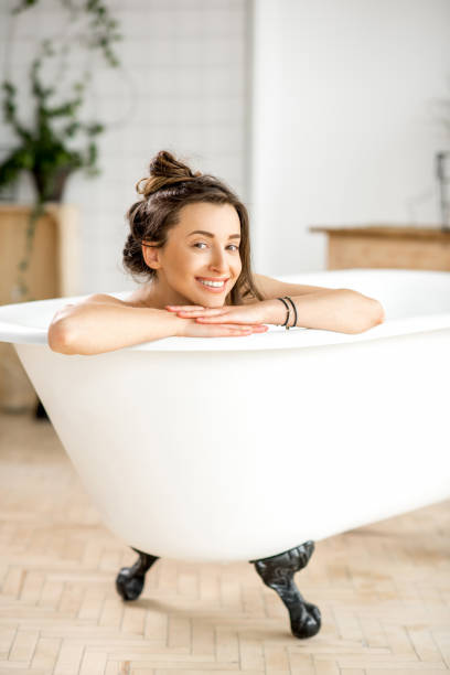 istock Woman relaxing in the bathtube 670004530